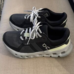 On Running Black and White Athletic Shoes